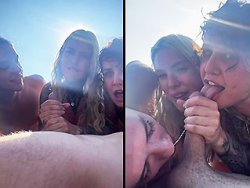 fellation, partouze - Trois jolies salopes sucent une grosse bite sur la plage